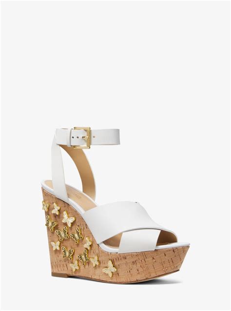 michael michael kors lacey butterfly embellished leather wedge|MICHAEL Michael Kors .